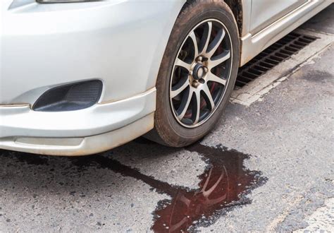 What It Means When Red Fluid Leaks from Your Car